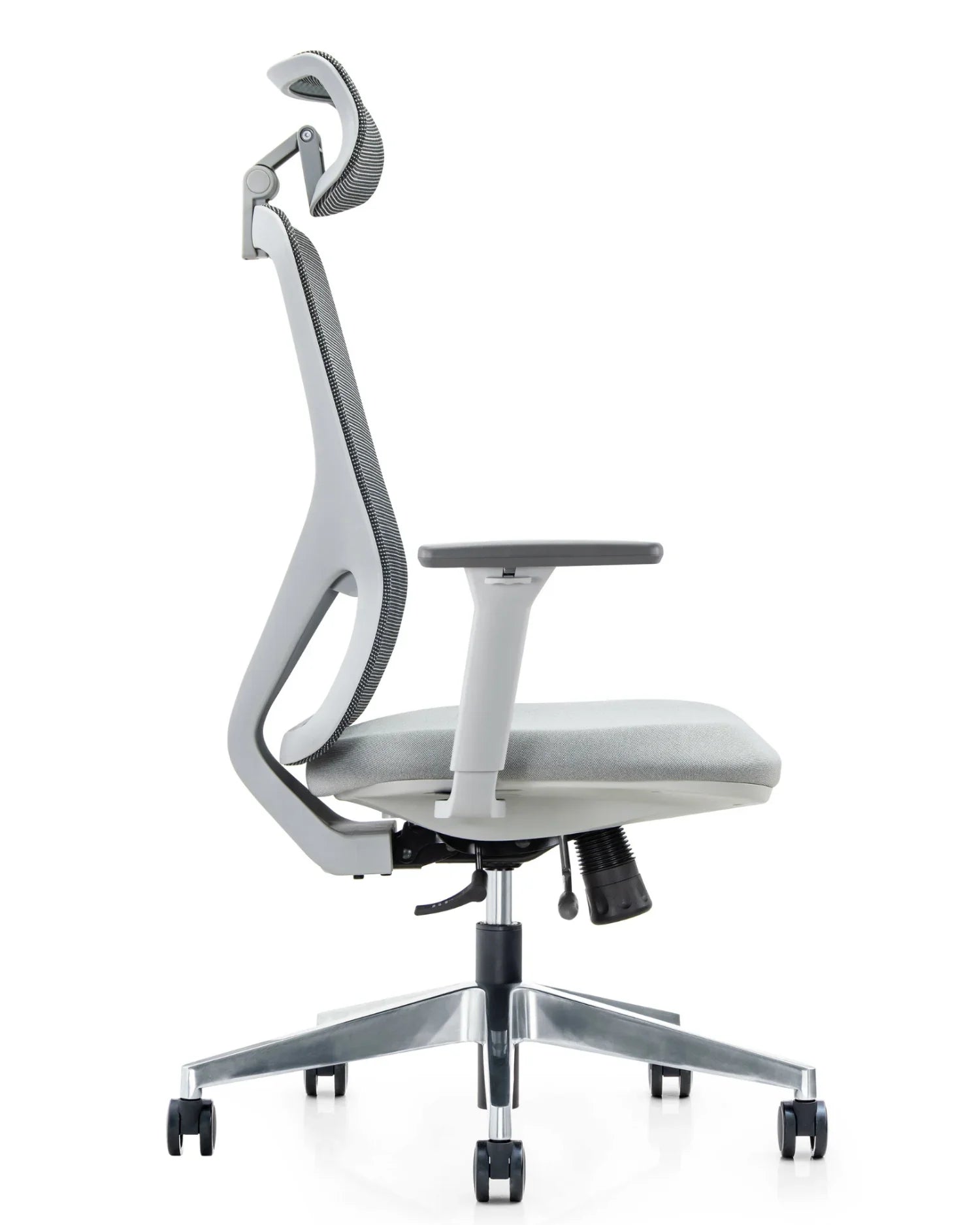 Perfil de la silla de oficina Placidita Plus gris, destacando su soporte lumbar y cabecero