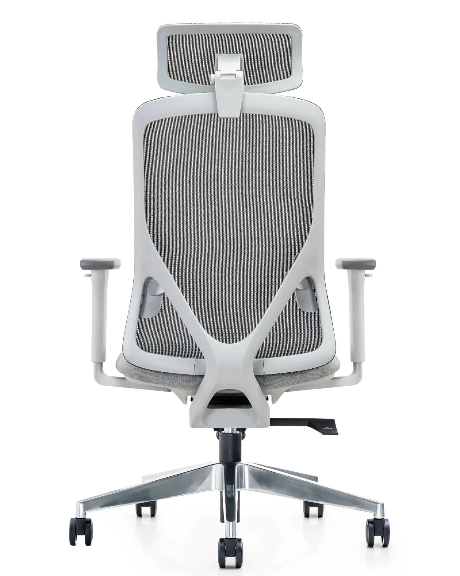 Vista posterior completa de la silla Placidita Plus gris, mostrando el diseño de su respaldo de malla